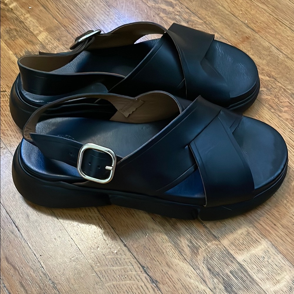 ATP Atelier Barisci Black Vacchetta Cross-Strap Sandals with Gold Buckle